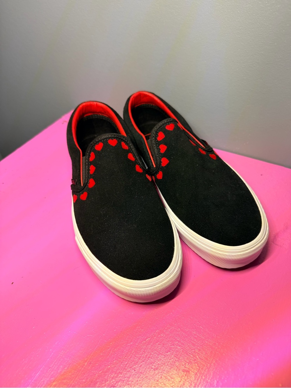 Vans Black Slip-On Sneakers with Red Heart Trim